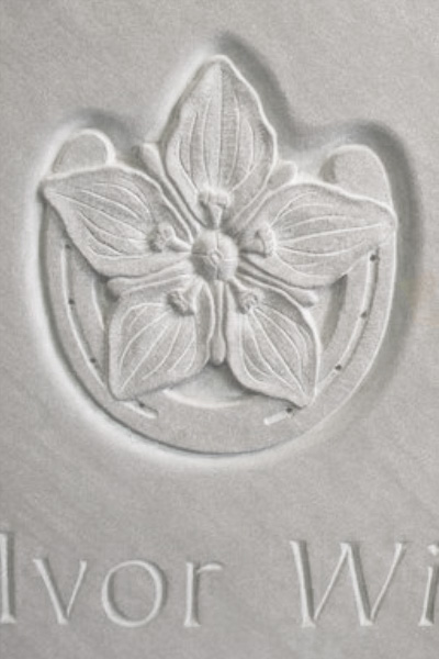 Carved rose and horseshoe